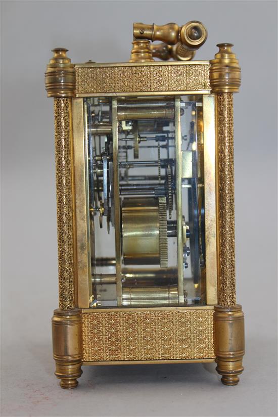 A late 19th century French ormolu hour repeating carriage clock, 7in., with travelling case